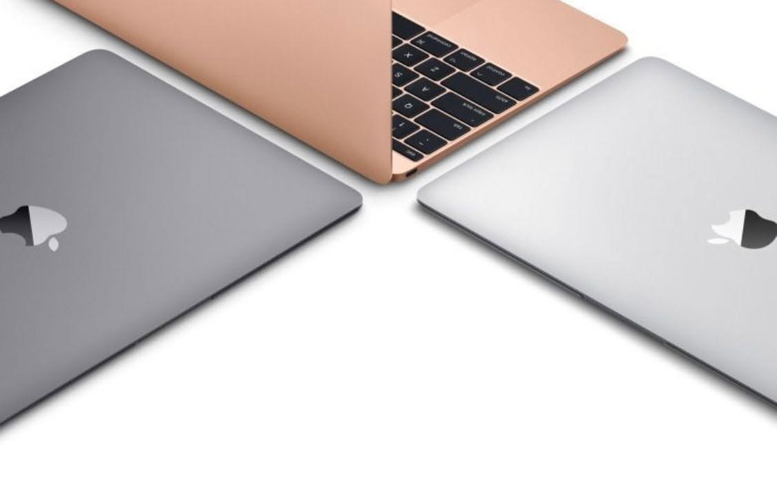 Laptops displayed in a premium product layout