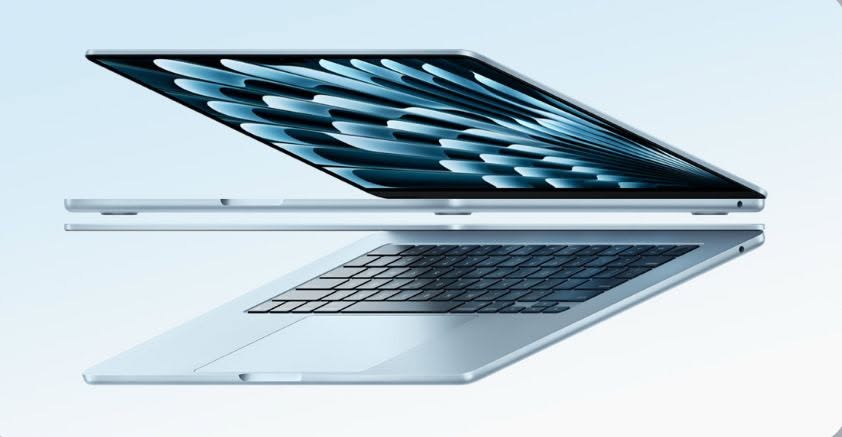 Open slim laptop shown from a side perspective