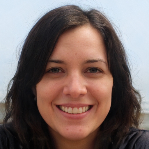 Professional headshot of Michael Roberts in formal business suit