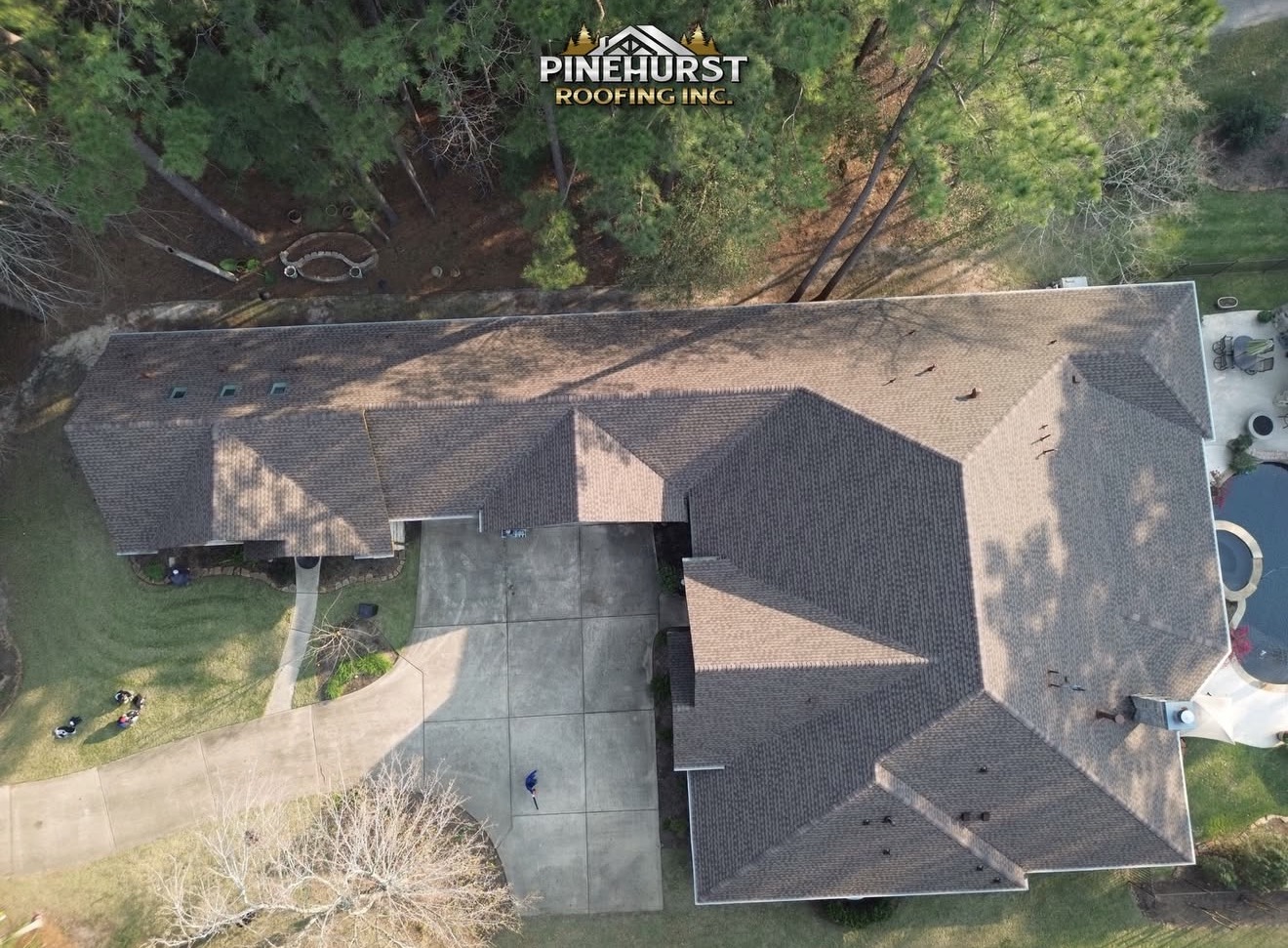 Pinehurst Roofing team at a job site