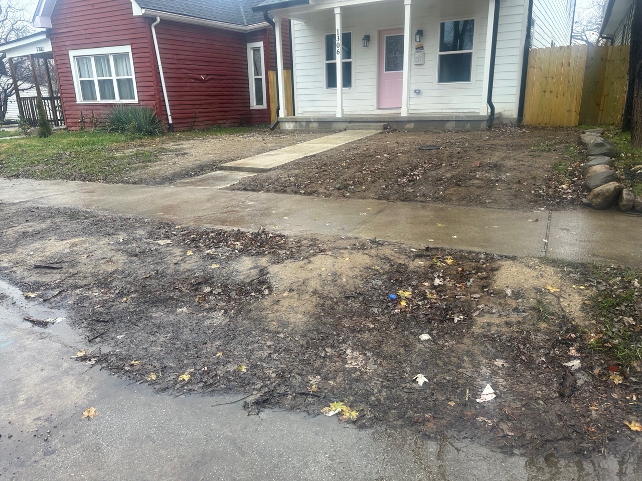 Messy garden bed before