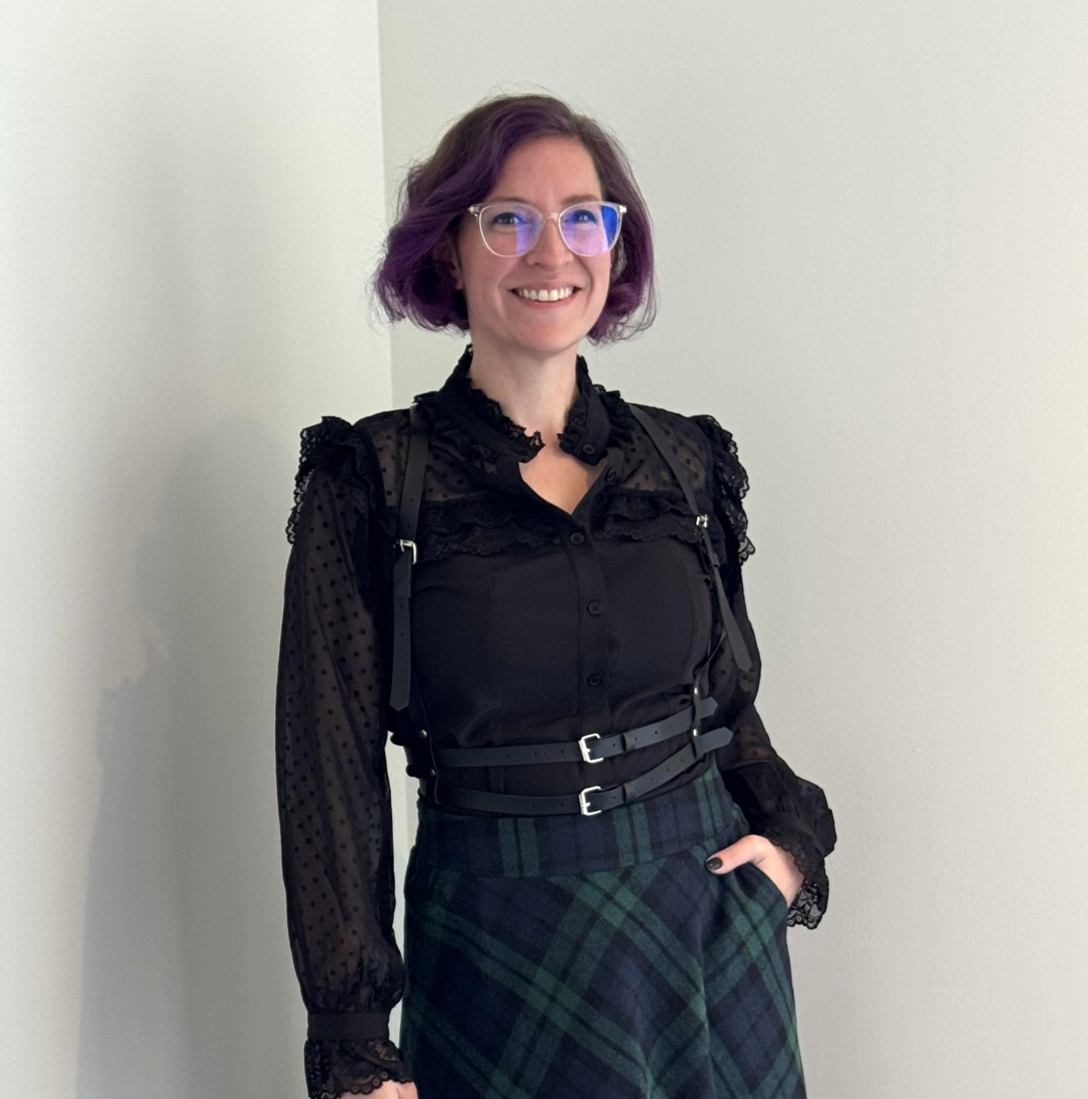 Portrait in dark, scholarly attire