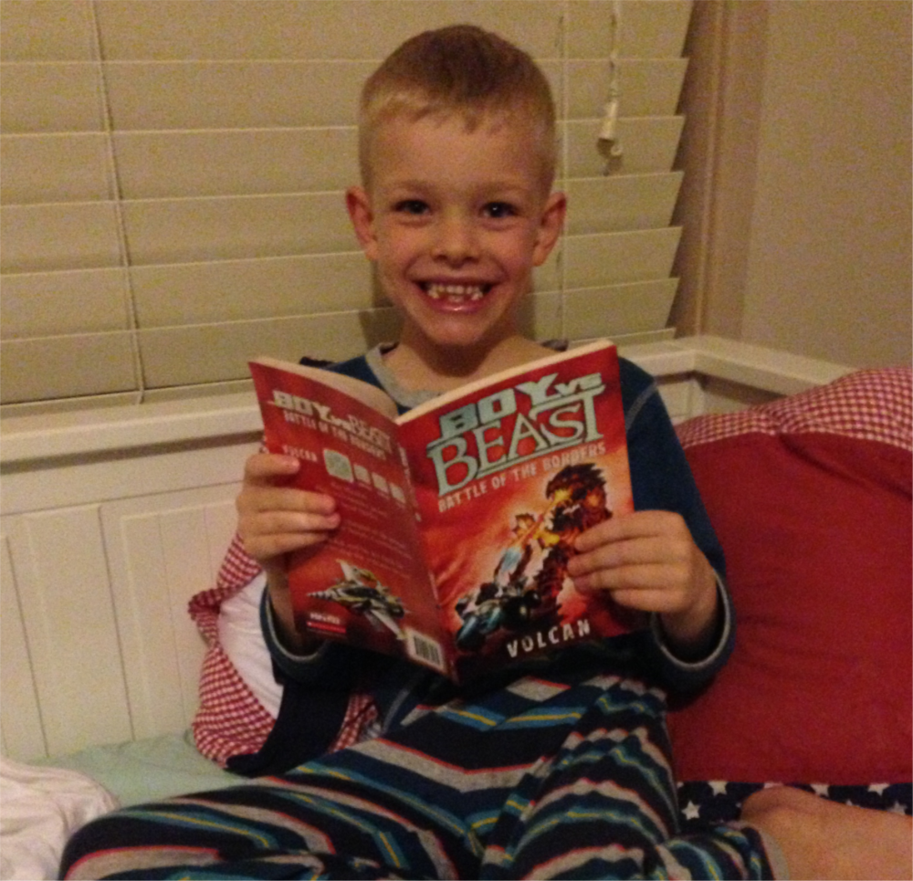 Child reading happily