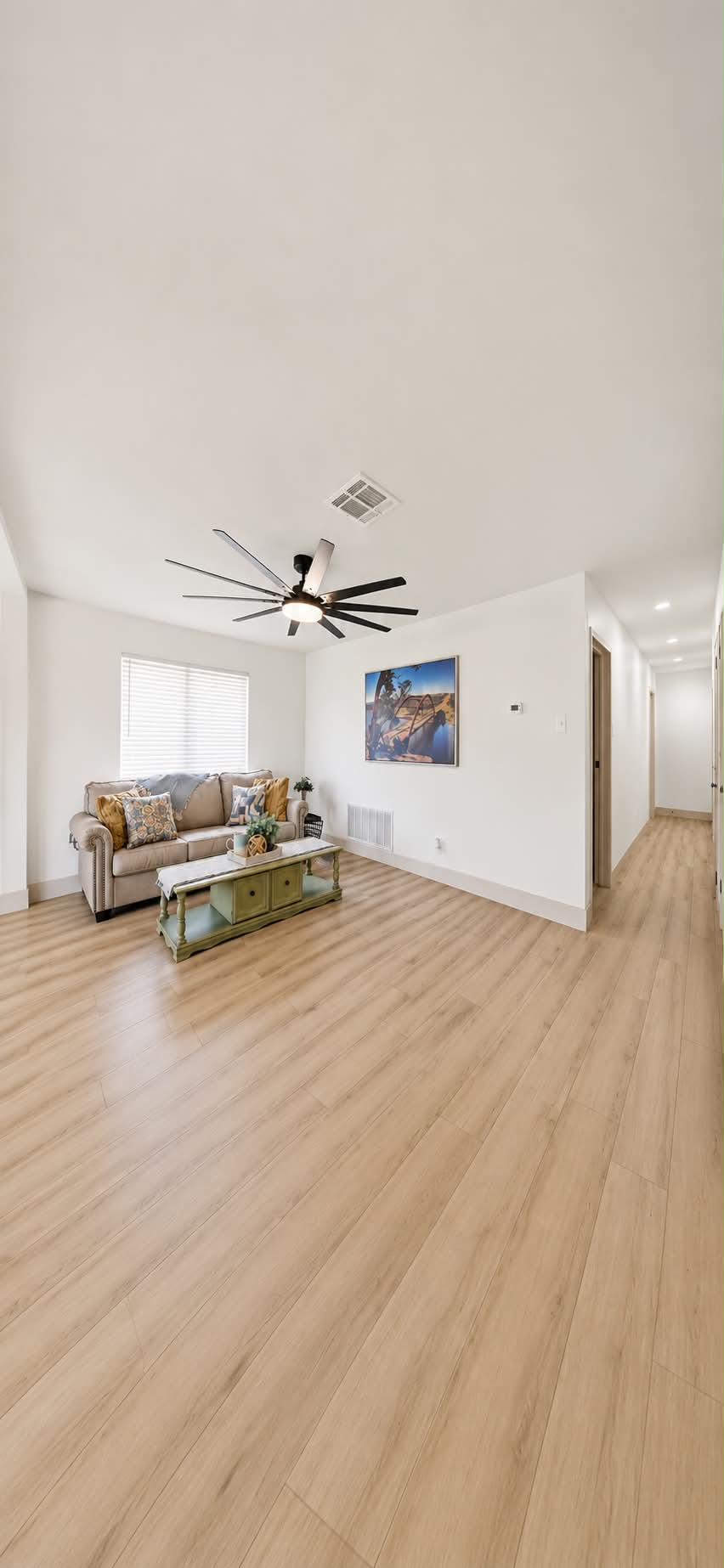 Modern flooring installation in a bright residential interior